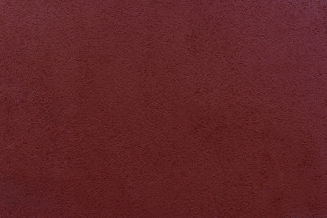 The texture is red. Wall. Fine pattern.