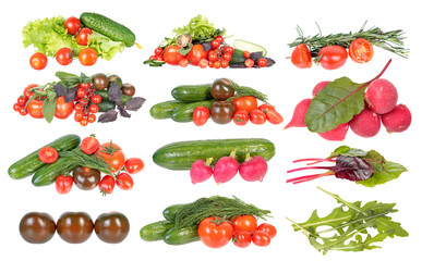Set of ingredients for vegetable salad isolated on white background. Red tomatoes, green cucumbers, purple and green basil, radish, sage and arugula leaves