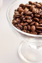 coffee beans inside glass cup