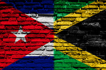 Flag of Cuba and Jamaica on brick wall