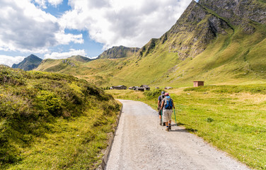 Fototapeta na wymiar The people are trekking on the Piora Valley in Switzerland.