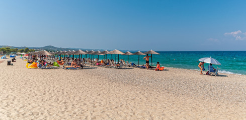 Halkidiki, Greece - September 05,2019: Porto Beach near Pefkochori, Halkidiki, Greece. One of the most beautiful beaches in the Halkidiki Peninsula.