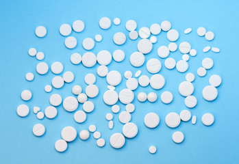 Sugar addiction, insulin resistance, unhealthy diet, sugar cubes on blue background, diabetes protection concept, top view.