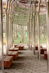 Fototapeta na wymiar Benches and a beautiful interior in the Park