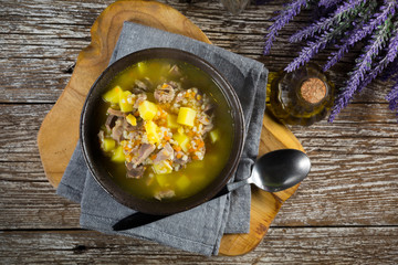Polish barley soup with vegetables and chicken heart.