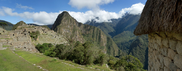 Panorama Machu Picchu Incan citadel. Andes Mountains Peru. Urubamba River valley.