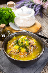 Polish barley soup with vegetables and chicken heart.
