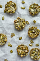 Healthy natural candies. Cookies with pumpkin seeds. Flat lay