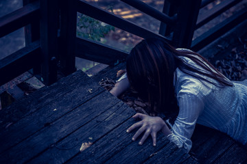 Portrait of asian woman make up ghost face with blood,Horror scene,Scary background,Halloween...