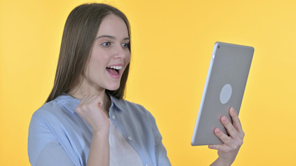 Portrait of Cheerful Young Woman Celebrating on Tablet