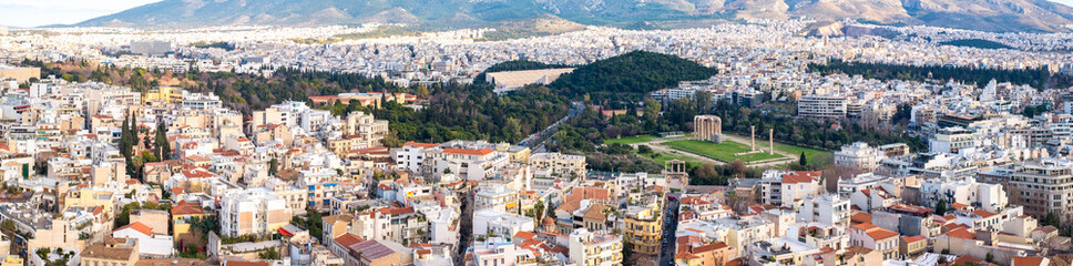 Panoramic view over the Athens city with Temple of Olympian Zeus taken from Acropolis