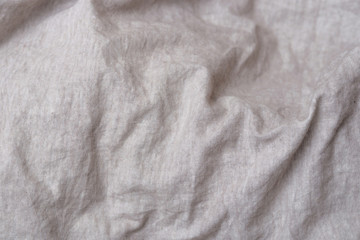 Fototapeta na wymiar Crumpled fabric texture, light cloth background
