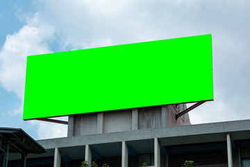 billboard blank and blue sky, copy space on green screen