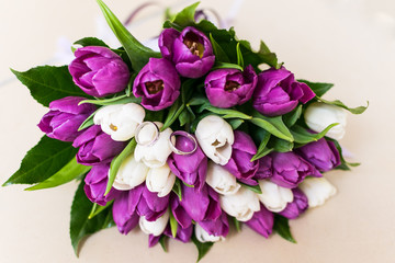 Spring wedding bouquet with rings