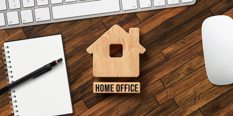 house symbol and wooden blocks with text HOME OFFICE on wooden background