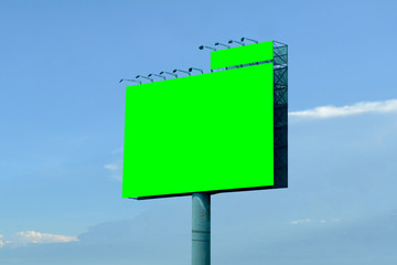 billboard blank and blue sky, copy space on green screen