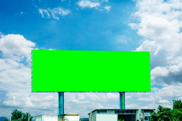 billboard blank and blue sky, copy space on green screen