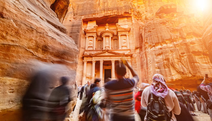 Large interesting tourist complex of the ancient city of Petra with tourists