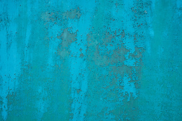 gros plan sur une plaque de m&eacute;tal bleue verte rouill&eacute;e