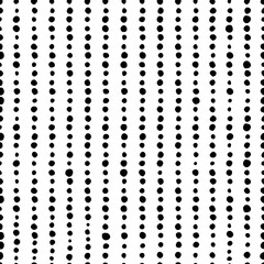 Seamless pattern. Vertical lines of black circles of different sizes and shapes isolated on white background. Art Texture for print, wallpaper, home decor, textile, package design