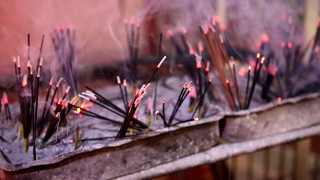 Incense close-up in the Indian Temple on a Religious Festival Diwali. Oil Lamp