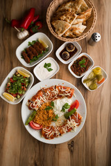 traditional turkish  beyti kebap meal  with garnitures