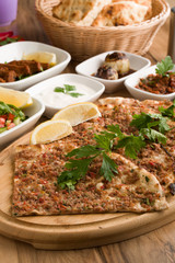 turkish lahmacun with garnitures