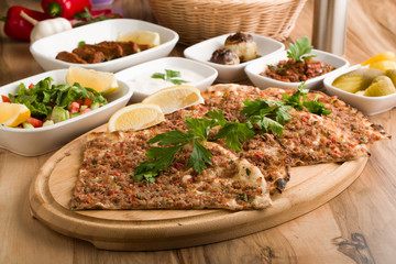 turkish lahmacun with garnitures