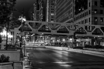 Naklejka na ściany i meble Chicago, night traffic between bridges and skyscrapers