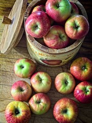 small red apples in basket