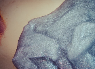 glitter slime transparent flexible viscous. game for children. antistress. beautiful background