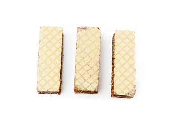 Crispy wafers with creamy hazelnut filling isolated on white background