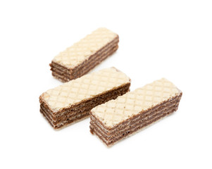 Crispy wafers with creamy hazelnut filling isolated on white background