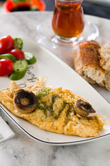 scrambled eggs with mushroom tomato and cucumber
