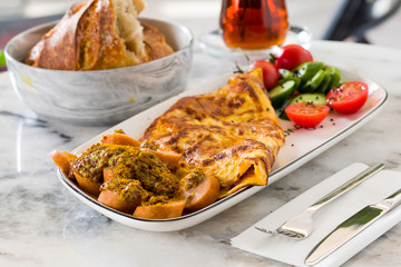 scrambled egg with sausage and bread