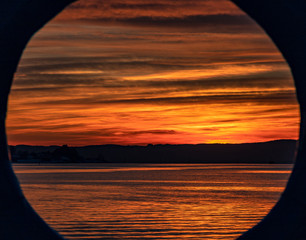 Circle sunset at sea