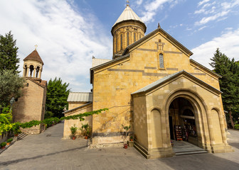 Fototapeta premium Sioni Cathedral, one of the many Georgian Orthodox churches in Tbilisi, Georgia, is in Old Town surrounded by trees