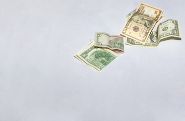 US dollars on a white background. Several banknotes, copy space, place for text.
