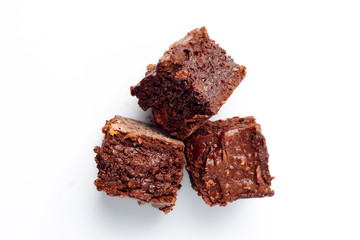 Flatlay with brownie pieces isolated on a white.