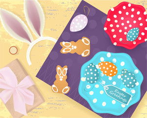 Easter Greetings banner with gift box, Easter Eggs, cookies, plates with Easter Eggs, bunny ears on abstract background, holiday
