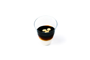 glass of mousse and coffee isolated on white background