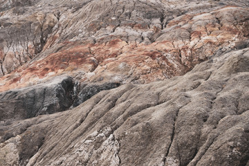 Fototapeta na wymiar Misty mountains volcano valley ridges rock stone formation plates smoke geyser steam hill