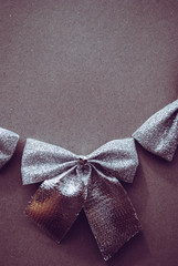 bows silver composition gray background. Christmas tree decorations