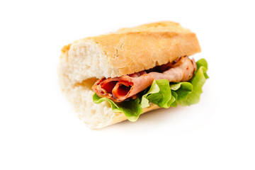 sandwich with salad and bacon isolated on white background