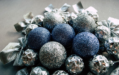 New Year's toys. Merry Christmas. bows. balls and sparkles background