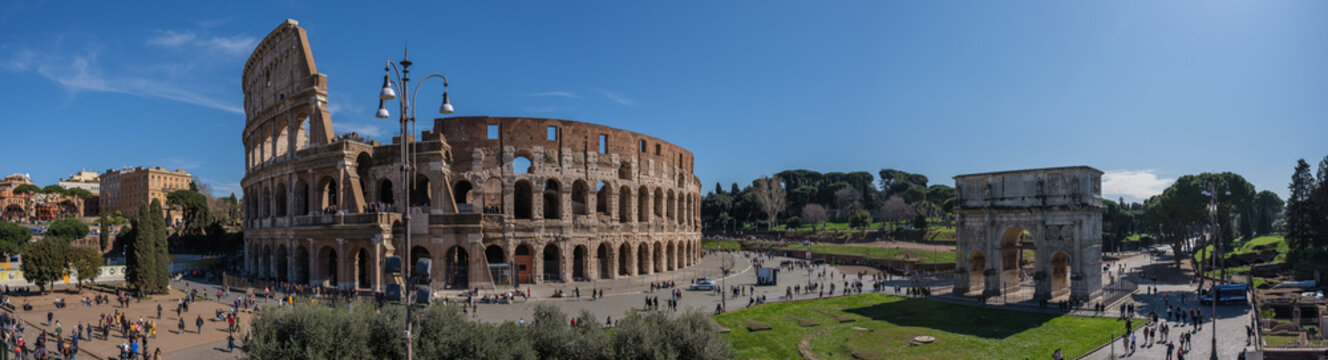 Colosseum and Triumph Arc view, from Fori Imperiali, Rome, Italy