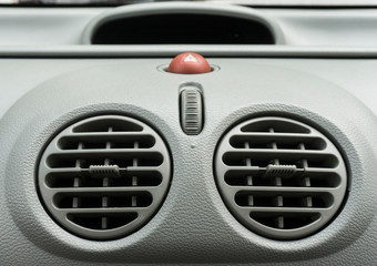 Car air conditioner grid panel on console