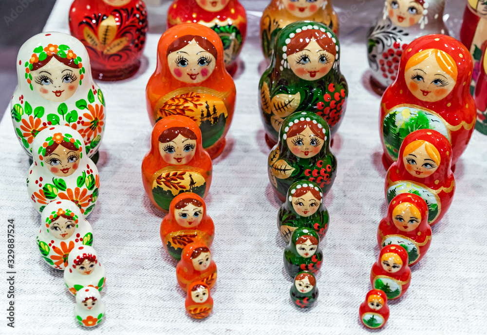 Wall mural Russian wooden doll matryoshka. Traditional souvenir from Russia is a nesting doll.