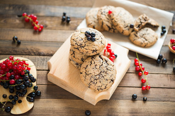 Sweet dessert. Homemade baking. Chocolate oatmeal cookies with black and red currants