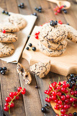 Sweet dessert. Homemade baking. Chocolate oatmeal cookies with black and red currants